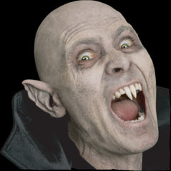 vampire latex ears by black label latex, flesh coloured.