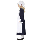 Side profile of child's historical dress featuring long sleeves, apron overlay, and bonnet-style mop hat.