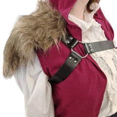 person wearing leather look viking or medieval harness with fur accent on shoulder
