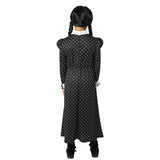 Back view of Wednesday Deluxe child black floral dress costume
