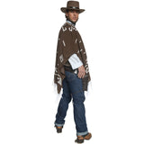 Man wearing a brown poncho with white patterns, blue jeans, and a brown hat on a white background