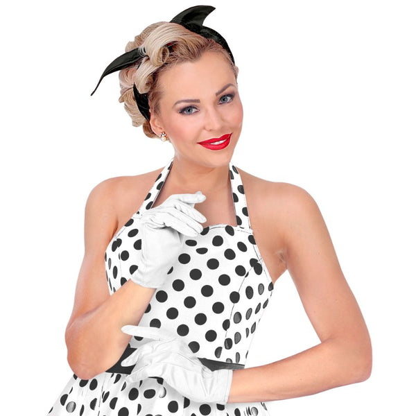 Woman wearing white wrist length gloves