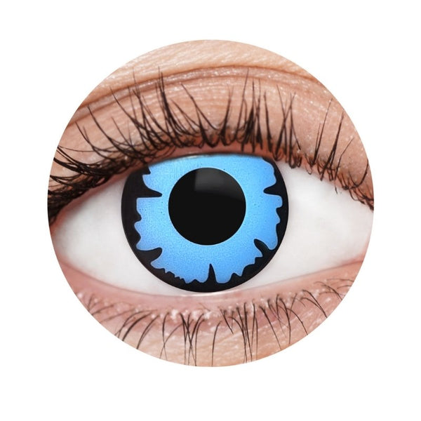 Close-up of a brown eye with a blue contact lens on a white background