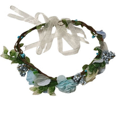 Floral headband with greenery and ribbons on a white background