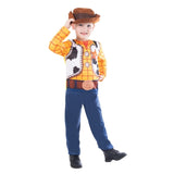 Child posing in Woody Toy Story costume with cowboy hat and sheriff outfit