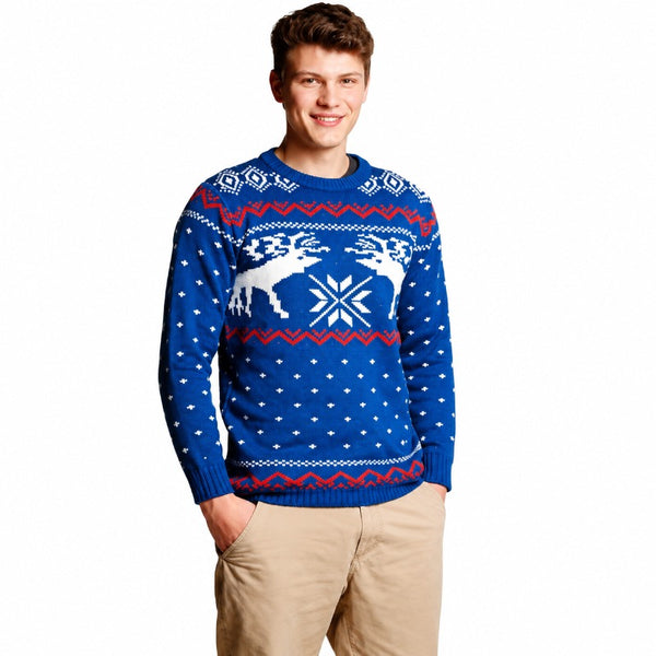 Man wearing blue Christmas reindeer jumper with festive Nordic knit pattern