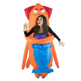 inflatable squid costume clutching a mermaid.