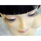 zigzag black eyelashes with glue.