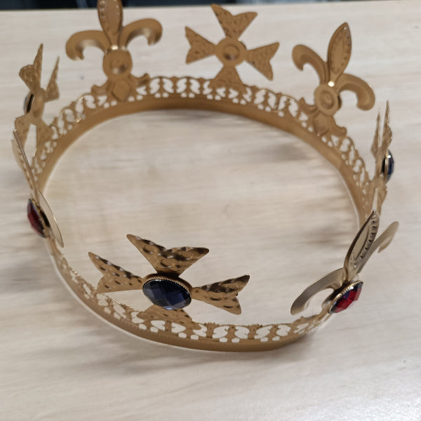 Gold kings crown with coloured gems.