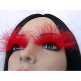 Eyelashes, floating red feathers, very large.