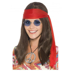 brown hippie chick kit includes long straight hair with centre part, red headband, glasses and peace pendant.