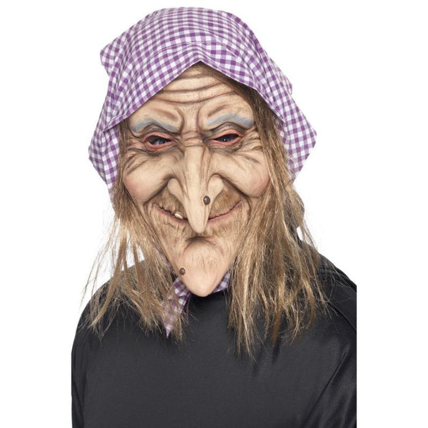 old witch mask with hair around the face and check scarf.